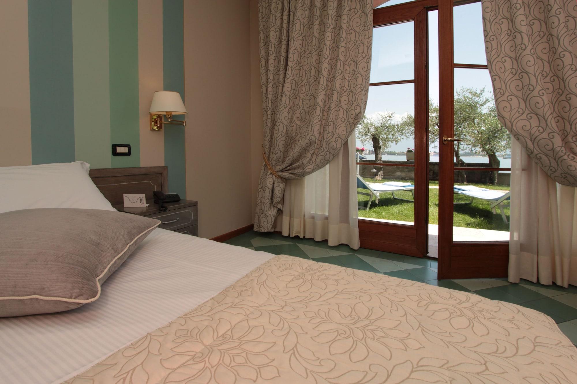 Hotel Villa Maria Au Lac - Estella Hotels Italia トスコラーノ・マデルノ エクステリア 写真