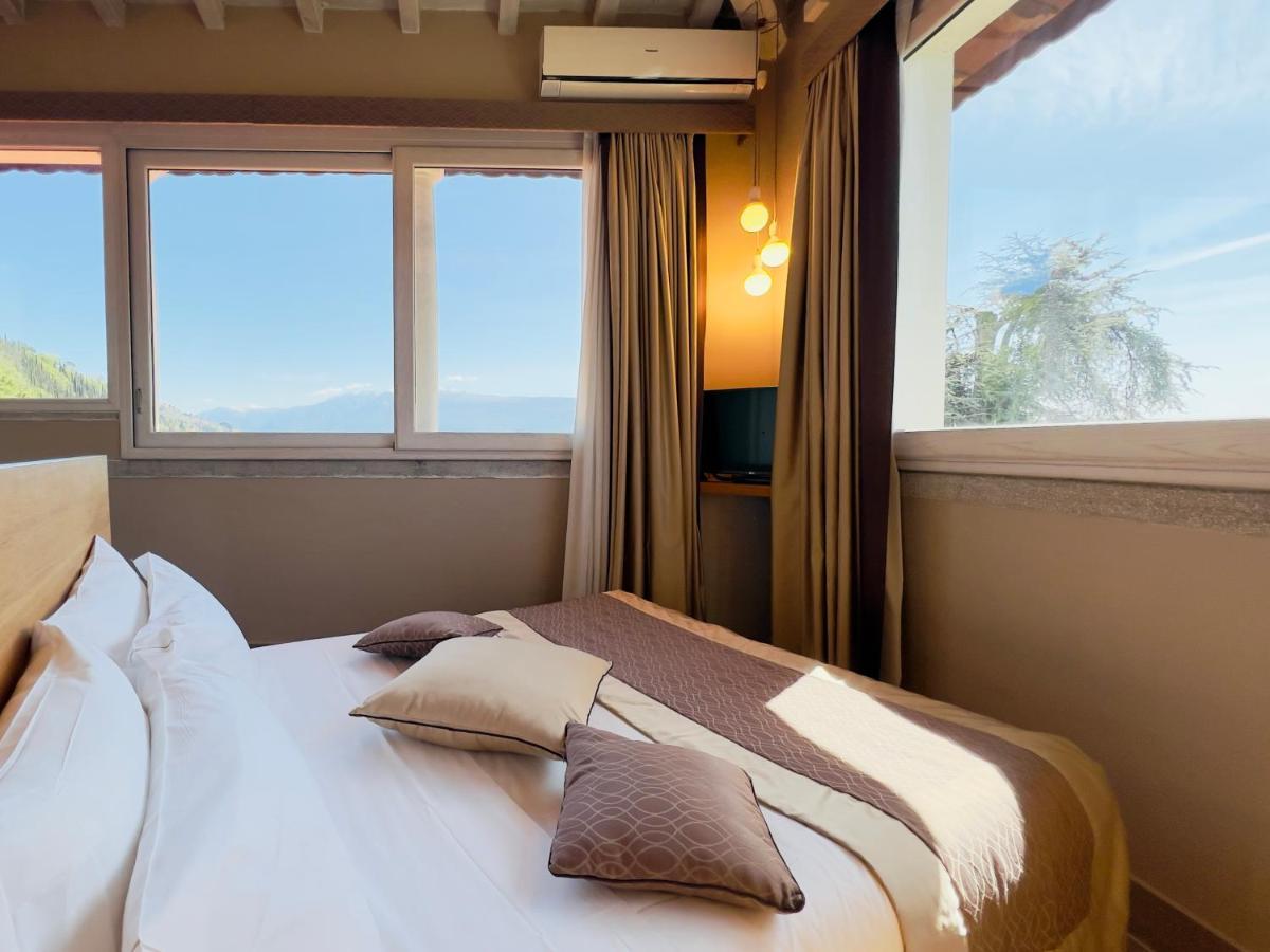 Hotel Villa Maria Au Lac - Estella Hotels Italia トスコラーノ・マデルノ エクステリア 写真